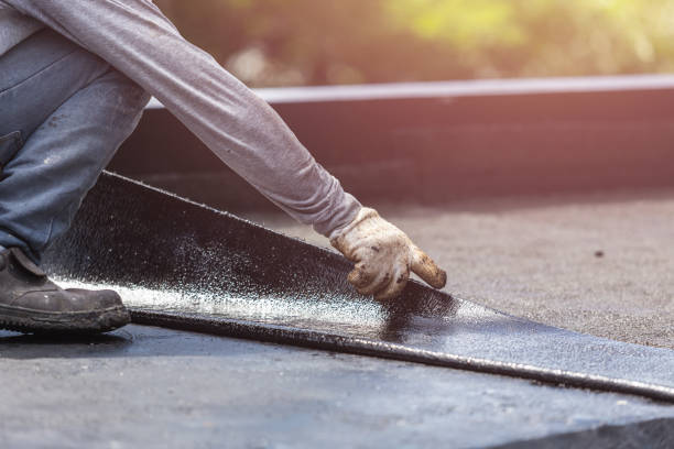 Professional Basement Waterproofing technician working in Greensboro, IN